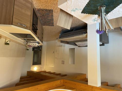 a room with a row of stairs in a synagogue at Palazzo Maggiore Suite A in Noale