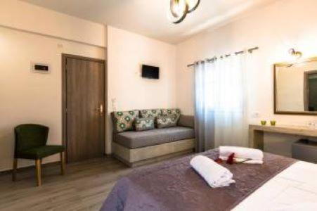 Ένα ή περισσότερα κρεβάτια σε δωμάτιο στο HOTEL Dolphin
