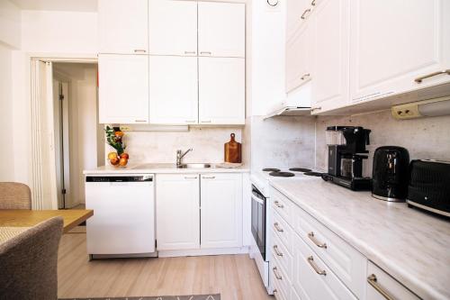 Dapur atau dapur kecil di Come in! "Pirkanportti" In the heart of Tampere next to the railway station for 9 people!