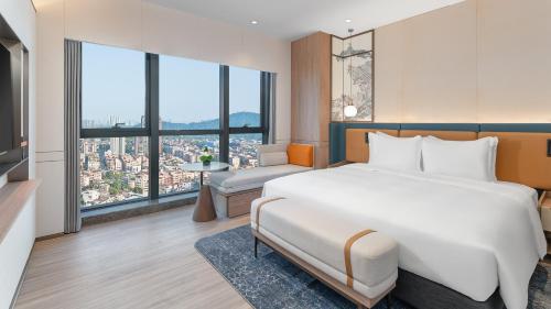 Postel nebo postele na pokoji v ubytování Holiday Inn Express Shunde Daliang by IHG