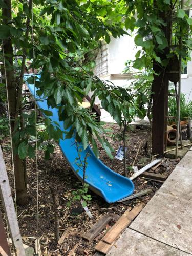 a blue rubber boots in a tree at Apartmány na náměstí - Kounice in Kounice