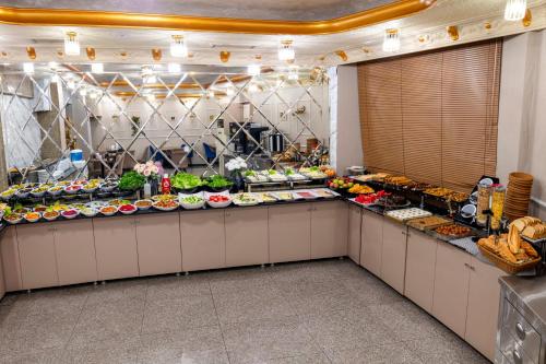 a buffet line with many different types of food at Hamit Hotel Istanbul in Istanbul