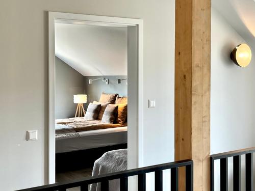 Una cama o camas en una habitación de Lindarhóll Guesthouse