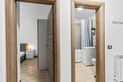 Et badeværelse på Divin Apartments Beach Resort