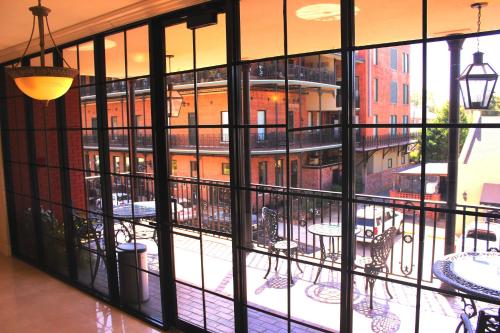 a view of a courtyard from a window of a building at Church Street Inn in Natchitoches