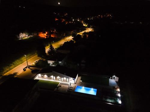 an aerial view of a building at night at Kuća Grab in Grab