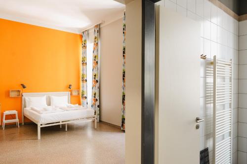 Postel nebo postele na pokoji v ubytování Wombat's City Hostel Budapest