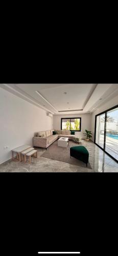 Vuode tai vuoteita majoituspaikassa Villa SOFIANE