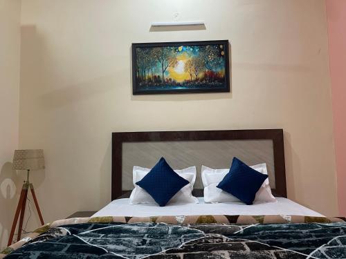 Postel nebo postele na pokoji v ubytování Hotel Royal Residency