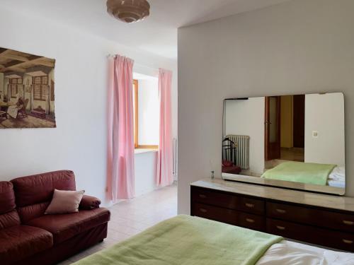 Ένα ή περισσότερα κρεβάτια σε δωμάτιο στο Casa Borgo