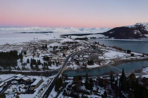 an aerial view of a town in the snow at Lake Lodge Tekapo in Lake Tekapo