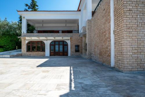 Fotografie z fotogalerie ubytování Villa Cleopatra - Seaview, Pool & Tennis court v destinaci Kalamos