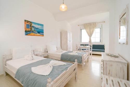 Postel nebo postele na pokoji v ubytování Villa Kallithea