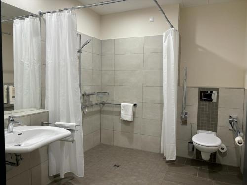 Koupelna v ubytování Leben wie im Hotel by Helios