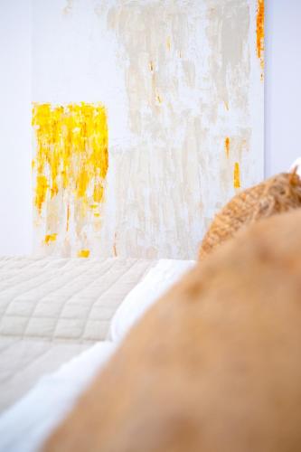 a close up of a bed in a bedroom at Princess Hotel in Lassi