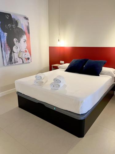 Ein Bett oder Betten in einem Zimmer der Unterkunft Osito Hub - Colomer