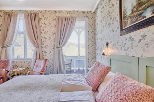 Ένα ή περισσότερα κρεβάτια σε δωμάτιο στο Visnes Hotel Stryn