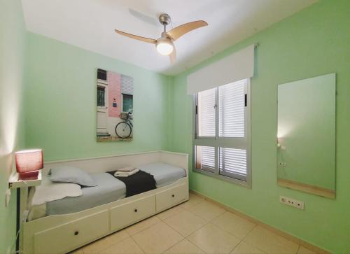 En eller flere senge i et værelse på La Ladera El Medano Beach Apartment