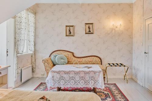 Ένα ή περισσότερα κρεβάτια σε δωμάτιο στο Visnes Hotel Stryn