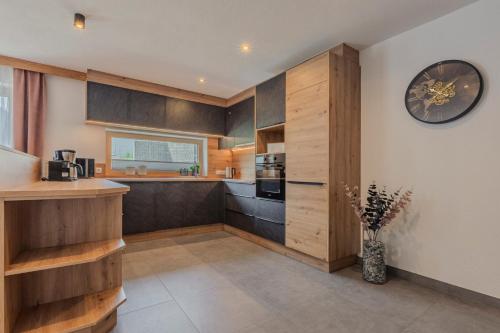 Kuchyň nebo kuchyňský kout v ubytování Chalet Waldhart