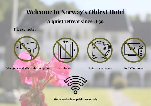 a bunch of signs with a pink flower at Tørvis Hotell in Luster