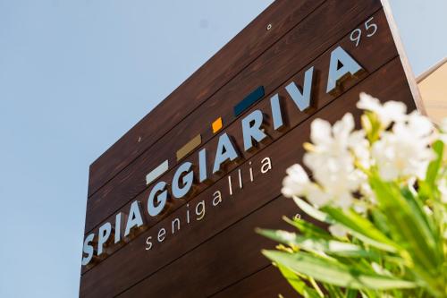 a sign for the sierravenan san pedro institution at HR Resort in Senigallia