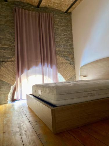 Ένα ή περισσότερα κρεβάτια σε δωμάτιο στο Cosy Moods - OldTown