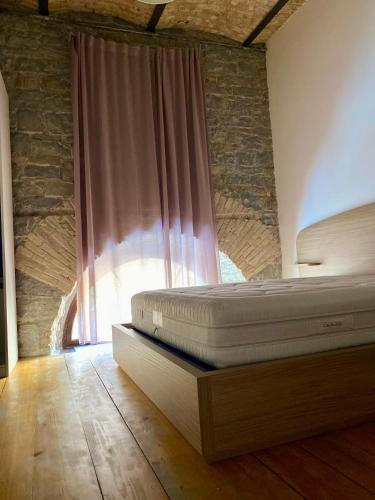 Ένα ή περισσότερα κρεβάτια σε δωμάτιο στο Cosy Moods - OldTown