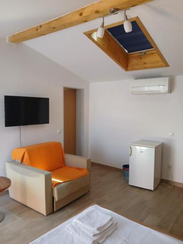 TV a/nebo společenská místnost v ubytování Bed & Breakfast Grgic