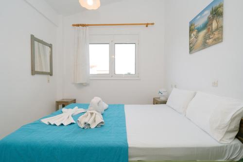 Postel nebo postele na pokoji v ubytování Villa Kallithea