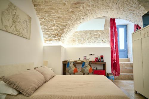 En eller flere senge i et værelse på La Casa di Mary