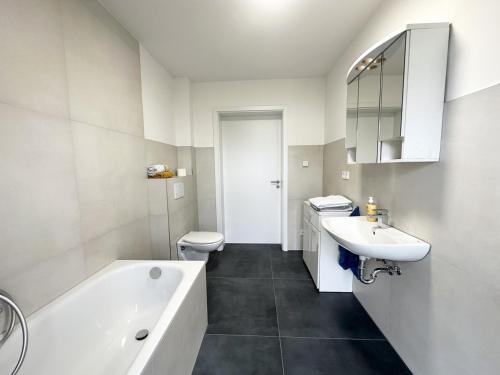 Ένα μπάνιο στο Comfy Apartment in Sankt Augustin