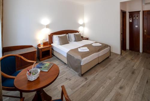 Postel nebo postele na pokoji v ubytování Fonte Hotel