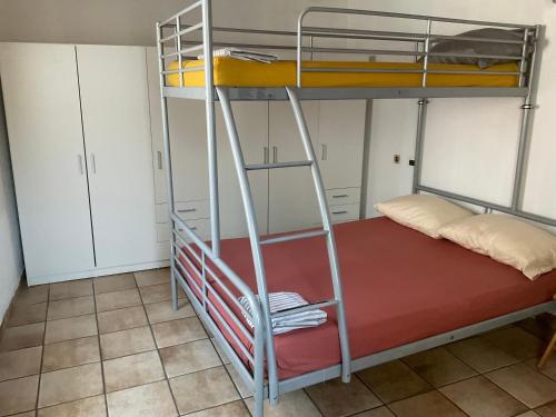 A bed or beds in a room at PudApartment Holiday Home