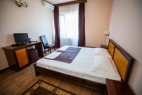 Katil atau katil-katil dalam bilik di Hotel Hanul de la Rascruce