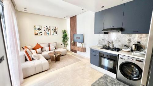 Η κουζίνα ή μικρή κουζίνα στο E19 Appartement moderne et calme à Maarif Casablanca