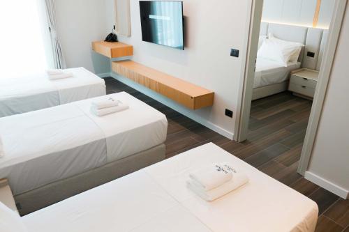 Postel nebo postele na pokoji v ubytování Ilyonis Hotel & Spa