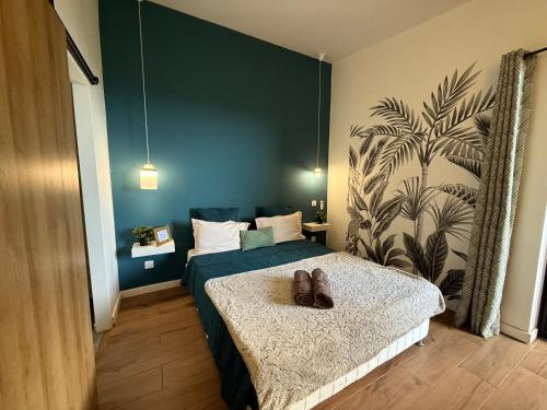 a bedroom with a dog laying on a bed at Cocoon Love avec piscine privative in Saint-Louis