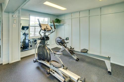 a gym with two exercise bikes in a room at St Helena Island Condo - half Mi to Beach in Oceanmarsh Subdivision