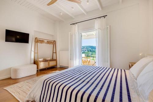 Ένα ή περισσότερα κρεβάτια σε δωμάτιο στο Decavos House