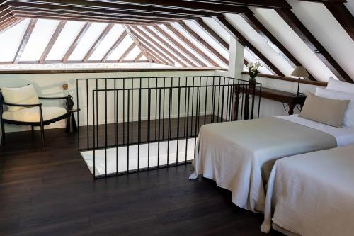 Postel nebo postele na pokoji v ubytování Heritage house Stone Orchard