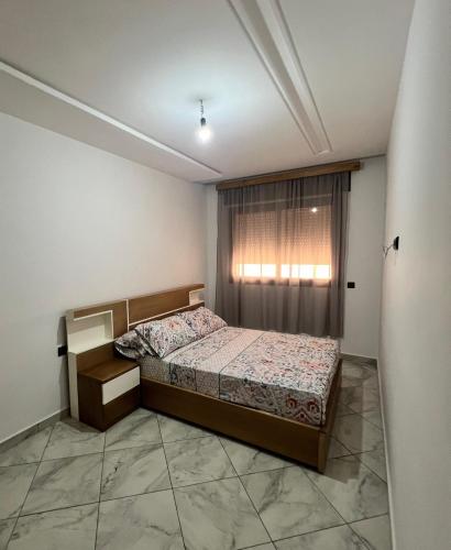 Postel nebo postele na pokoji v ubytování Appartements familiaux confortables à 5 min de la plage Martil شقق عائلية مريحة على بعد 5 دقائق من الشاطئ مرتيل