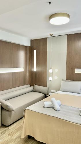 Morfeas City Hotelにあるベッド