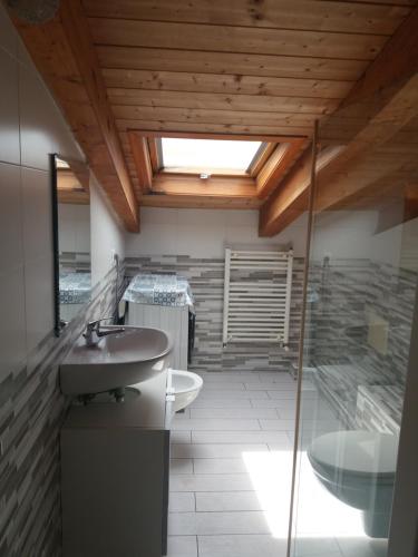 a bathroom with a sink and a shower at Casa Regina Elena II in Termoli