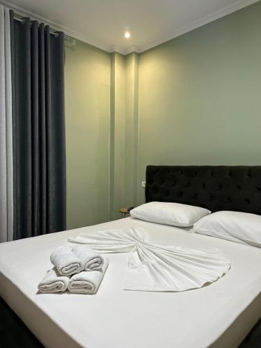 Una cama o camas en una habitación de Hotel Erta