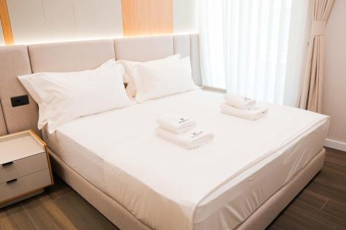 Postel nebo postele na pokoji v ubytování Ilyonis Hotel & Spa