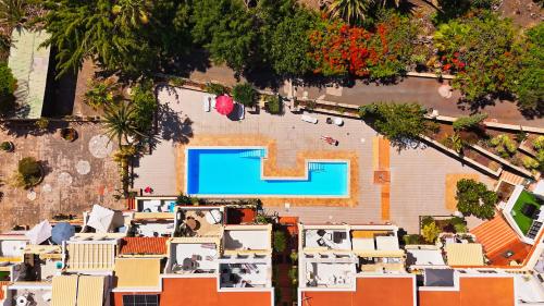 an overhead view of a house with a swimming pool at Winsdor Costa Adeje Apartment in Adeje