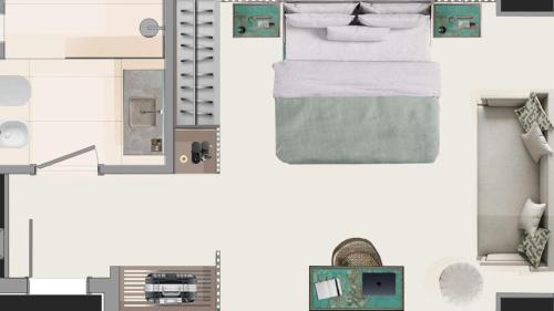 a floor plan of a room with a bed at Abacus Hotel in Sesto San Giovanni