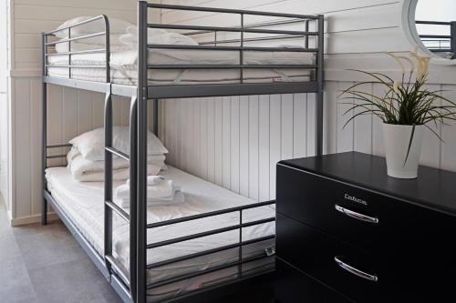 เตียงในห้องที่ Northern Light Hotell/Camp Steinfjord