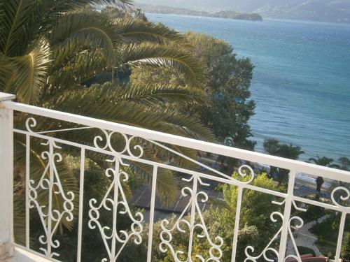 a balcony with a view of the ocean at Dimitra Apartments K in Kommeno